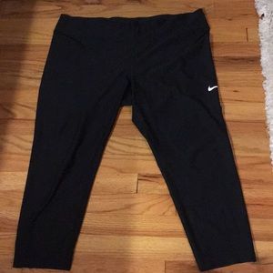 Nike Dri-Fit midrise leggings. Color black.